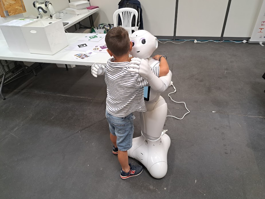 Child hugging Pepper