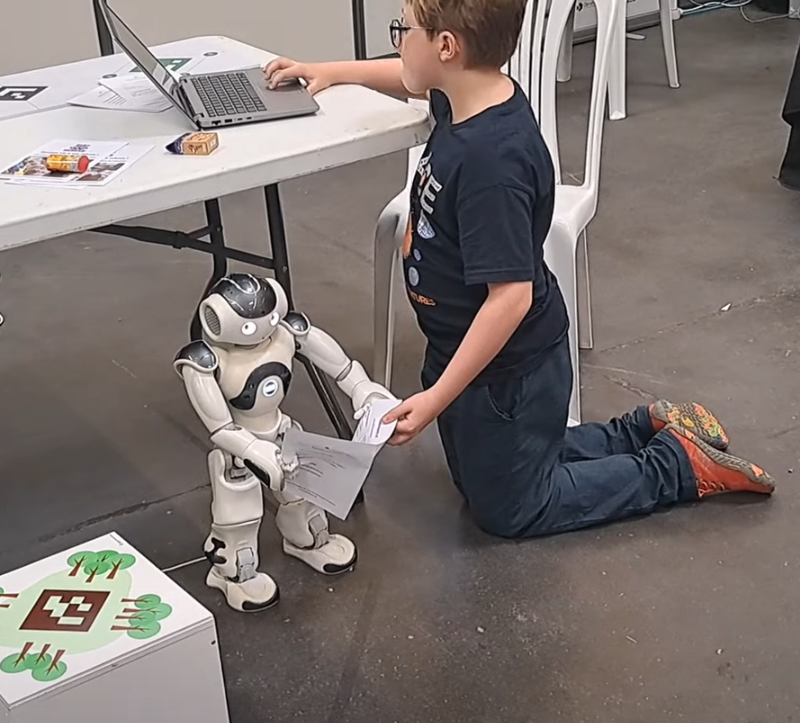 Child programming a NAO robot