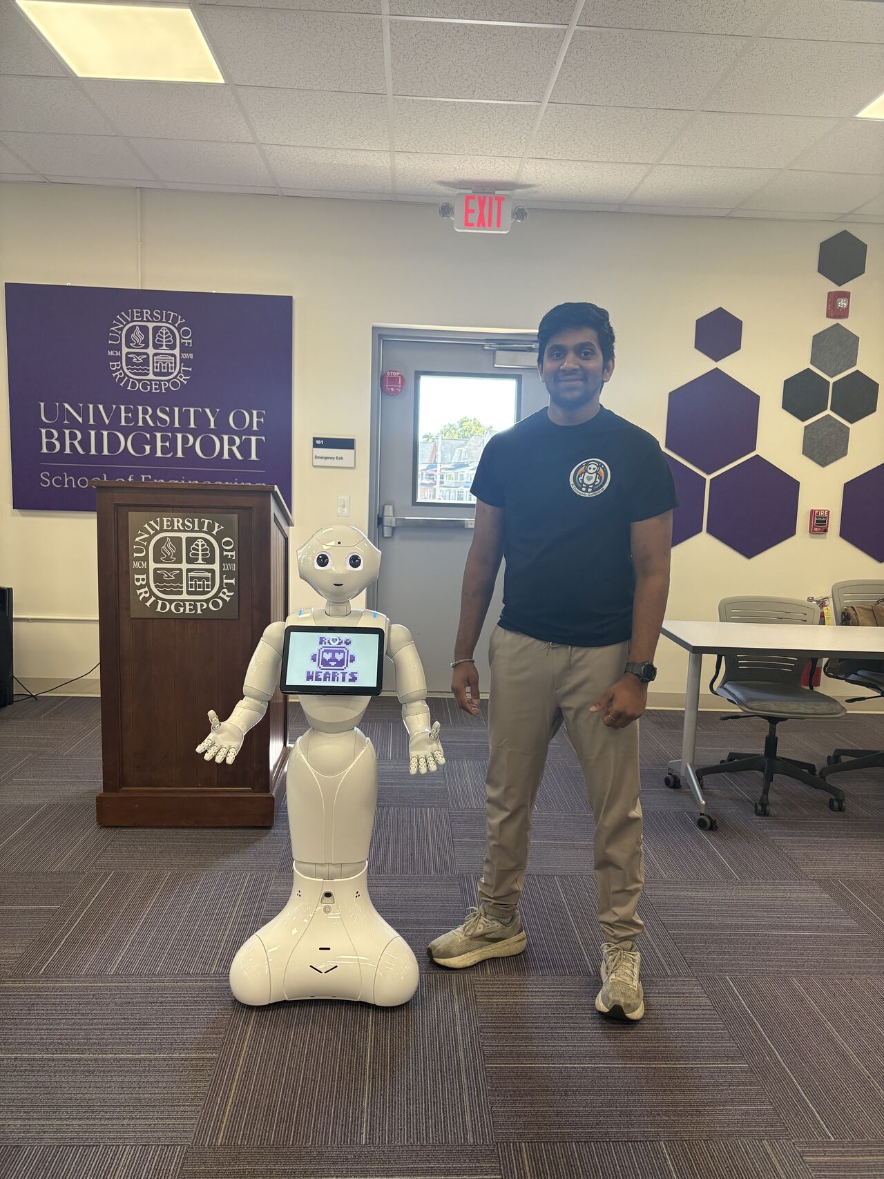 Student testing Pepper robot